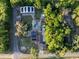 Aerial view displaying the home, backyard pool and landscaping at 1899 W Beresford Ave, Deland, FL 32720