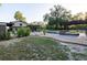 Lush backyard featuring a pool, fire pit and covered patio perfect for entertaining at 1899 W Beresford Ave, Deland, FL 32720