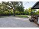Expansive backyard boasts a large brick patio and plenty of space for outdoor activities and entertaining guests at 1899 W Beresford Ave, Deland, FL 32720