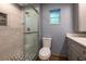Modern bathroom with tiled shower, updated vanity, and neutral paint at 1899 W Beresford Ave, Deland, FL 32720