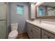 Clean bathroom with tiled shower, vanity with drawers, and light grey walls at 1899 W Beresford Ave, Deland, FL 32720