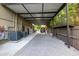 Covered parking with brick pavers and room for outdoor storage at 1899 W Beresford Ave, Deland, FL 32720