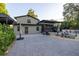 Expansive brick patio with chaise lounges and plenty of room for outdoor living at 1899 W Beresford Ave, Deland, FL 32720
