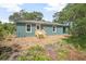 Back of newly renovated home with new wood porch and yard at 2145 8Th Ave, Deland, FL 32724