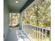 Relaxing balcony with views of lush greenery, providing a private outdoor space at 2145 8Th Ave, Deland, FL 32724