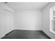 Bedroom with natural light from a window and gray wood-look flooring throughout at 2145 8Th Ave, Deland, FL 32724