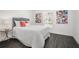 Serene bedroom with a plush bed, contemporary accents, and a window providing natural light and ventilation at 2145 8Th Ave, Deland, FL 32724