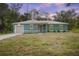 Charming single-story home featuring a new lawn and a front-facing two-car garage at 2145 8Th Ave, Deland, FL 32724