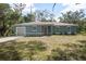 Charming single-story home featuring a new lawn and a front-facing two-car garage at 2145 8Th Ave, Deland, FL 32724