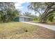 Exterior view of newly renovated home and driveway at 2145 8Th Ave, Deland, FL 32724