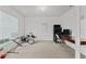 Bright bedroom with neutral carpet, large window and versatile space for office or music at 2150 Deck Ct, Deltona, FL 32738