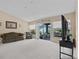 Bright living room with a sliding glass door leading to an outdoor area with great natural light at 2150 Deck Ct, Deltona, FL 32738