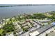 Aerial view of community featuring tropical foliage near the waterfront and commercial areas at 2200 S Palmetto Ave # B060, Daytona Beach, FL 32119