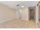 Inviting living area featuring tiled floors and an open layout connecting to the kitchen at 2200 S Palmetto Ave # B060, Daytona Beach, FL 32119