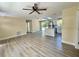 Open-concept living area with natural light, connecting living and kitchen spaces seamlessly at 249 Citra St, De Leon Springs, FL 32130