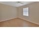 Bedroom with wood floors, ceiling fan and a bright window at 257 Deleon Rd, Debary, FL 32713