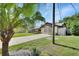 A well-maintained home with mature landscaping, a long driveway, and a privacy fence offers both curb appeal and seclusion at 257 Deleon Rd, Debary, FL 32713