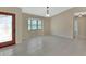 Bright living room boasting tiled floors, neutral walls, and a bay window for natural light at 257 Deleon Rd, Debary, FL 32713