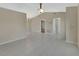 Open-concept living room showcasing neutral walls and tile flooring at 257 Deleon Rd, Debary, FL 32713