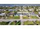 Waterfront homes with pools and well-maintained landscaping in a desirable coastal neighborhood at 2573 W Coral Way, Daytona Beach, FL 32118