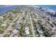 Stunning aerial view captures the home's location in a vibrant coastal community with beach access at 2573 W Coral Way, Daytona Beach, FL 32118
