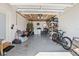 Spacious garage with a washer and dryer, storage shelves and room for vehicles at 2573 W Coral Way, Daytona Beach, FL 32118