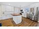 Beautiful modern kitchen with white cabinets, island, and stainless steel appliances at 2573 W Coral Way, Daytona Beach, FL 32118