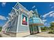 A modern building exterior with unique architectural details under a bright blue sky at 262 Coral Reef Way, Daytona Beach, FL 32124
