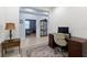 Office space with tile floors, wood desk and a view of the entryway and living room at 262 Coral Reef Way, Daytona Beach, FL 32124