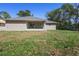 The house has a covered patio overlooking a spacious backyard at 266 Buford Ave, Orange City, FL 32763
