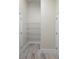 Walk-in pantry with shelving and tile floor at 266 Buford Ave, Orange City, FL 32763