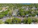 Scenic view of residences with mature trees, landscaping and dedicated parking at 2704 Lancaster Ct, Apopka, FL 32703