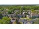 Scenic view of residences with mature trees, landscaping and dedicated parking at 2704 Lancaster Ct, Apopka, FL 32703