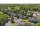 Scenic view of residences with mature trees, landscaping and dedicated parking at 2704 Lancaster Ct, Apopka, FL 32703