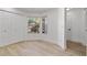 Bright bedroom with closet, large window, and neutral walls at 2704 Lancaster Ct, Apopka, FL 32703