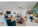 Open-concept space features living room and dining area, perfect for modern living at 2704 Lancaster Ct, Apopka, FL 32703