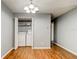 Laundry area with washer and dryer, wood-look floors, and neutral wall color at 2706 Oak Trail Run # 6, Port Orange, FL 32127