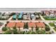 Coastal condos boast tile roofs, a shared pool, and stunning beach access, blending luxury with seaside charm at 2982 S Atlantic Ave, New Smyrna Beach, FL 32169