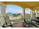 Inviting balcony with views of lush landscaping, with plenty of room for seating at 2982 S Atlantic Ave, New Smyrna Beach, FL 32169