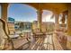 Spacious covered balcony providing ample seating and scenic neighborhood views at 2982 S Atlantic Ave, New Smyrna Beach, FL 32169