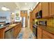 Spacious kitchen featuring stainless appliances, tiled backsplash, and granite countertops at 2982 S Atlantic Ave, New Smyrna Beach, FL 32169