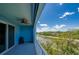 Beautiful balcony with a ceiling fan overlooks the marina at 3 Riverwalk Dr # 404, New Smyrna Beach, FL 32169