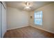 Spacious bedroom with a window at 3 Riverwalk Dr # 404, New Smyrna Beach, FL 32169