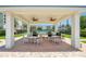 Enjoy the outdoor seating area complete with grills, tables, and ample space for dining and entertainment under the covered pavilion at 3 Riverwalk Dr # 404, New Smyrna Beach, FL 32169