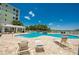 Relax and unwind by the pool with plenty of lounge chairs, a covered pavilion, and beautiful views of the surrounding landscape at 3 Riverwalk Dr # 404, New Smyrna Beach, FL 32169
