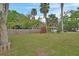 Charming home with large front yard and perimeter fence at 310 Main St, Enterprise, FL 32725