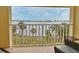Enjoy tranquil water views from this balcony overlooking palm trees and the coast line at 3131 S Ridgewood Ave # 4120, Daytona Beach, FL 32119