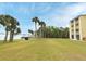 Relax and enjoy this beautiful manicured lawn with mature trees and bay access at 3131 S Ridgewood Ave # 4120, Daytona Beach, FL 32119