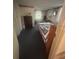 Cozy bedroom with a comfortable bed, complemented by natural light from the window at 328 W Connecticut Ave, Lake Helen, FL 32744