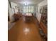 Dining area features a traditional dining table, creating an inviting space for meals at 328 W Connecticut Ave, Lake Helen, FL 32744